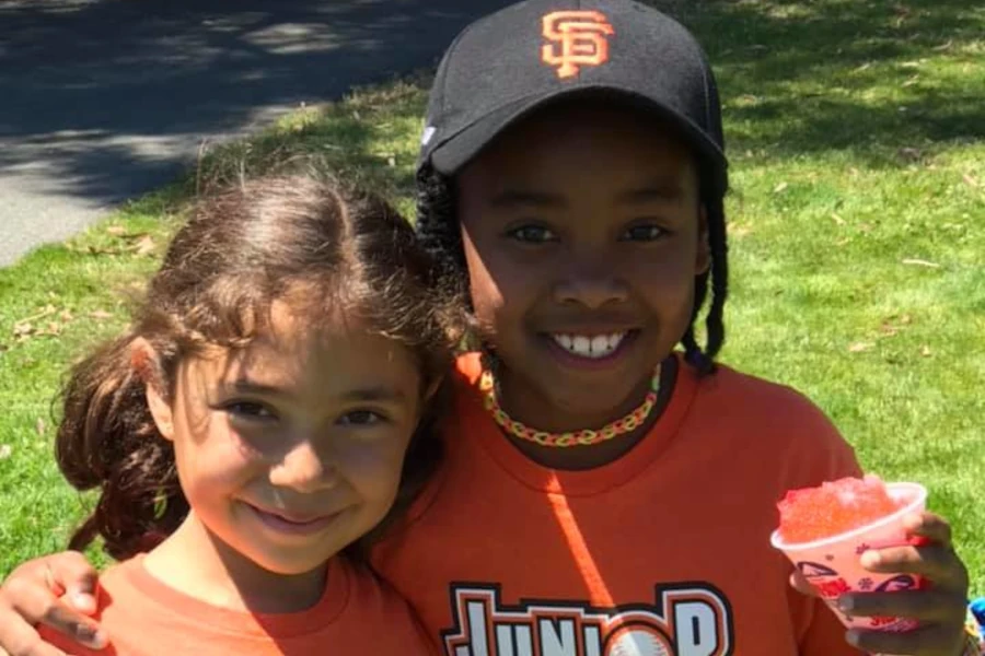 Kids wearing JR Giants t-shirts