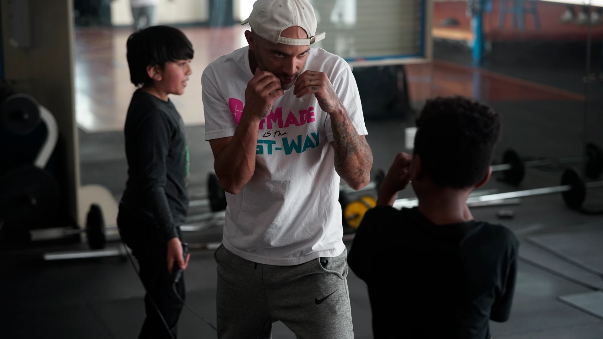 kids boxing with trainer