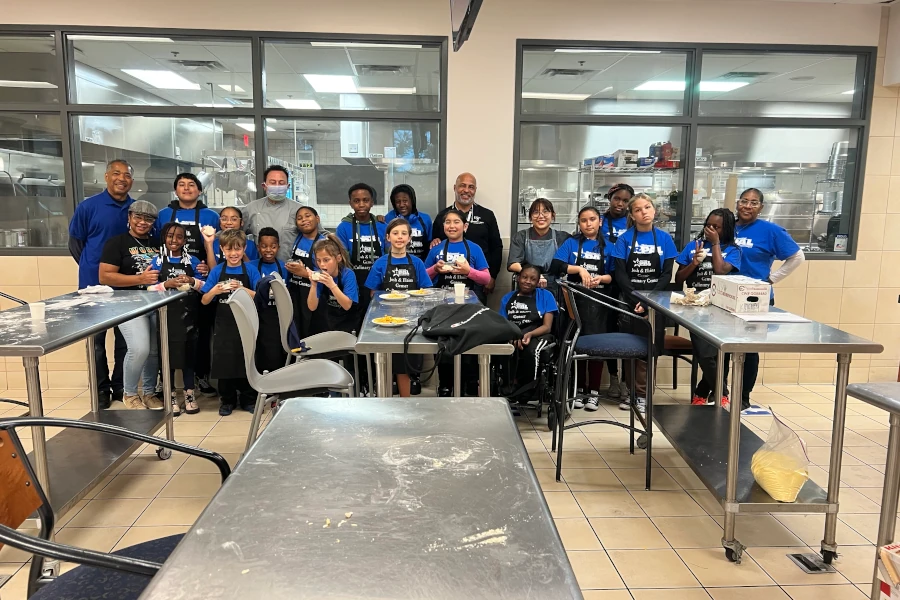 group of kids in a cooking class