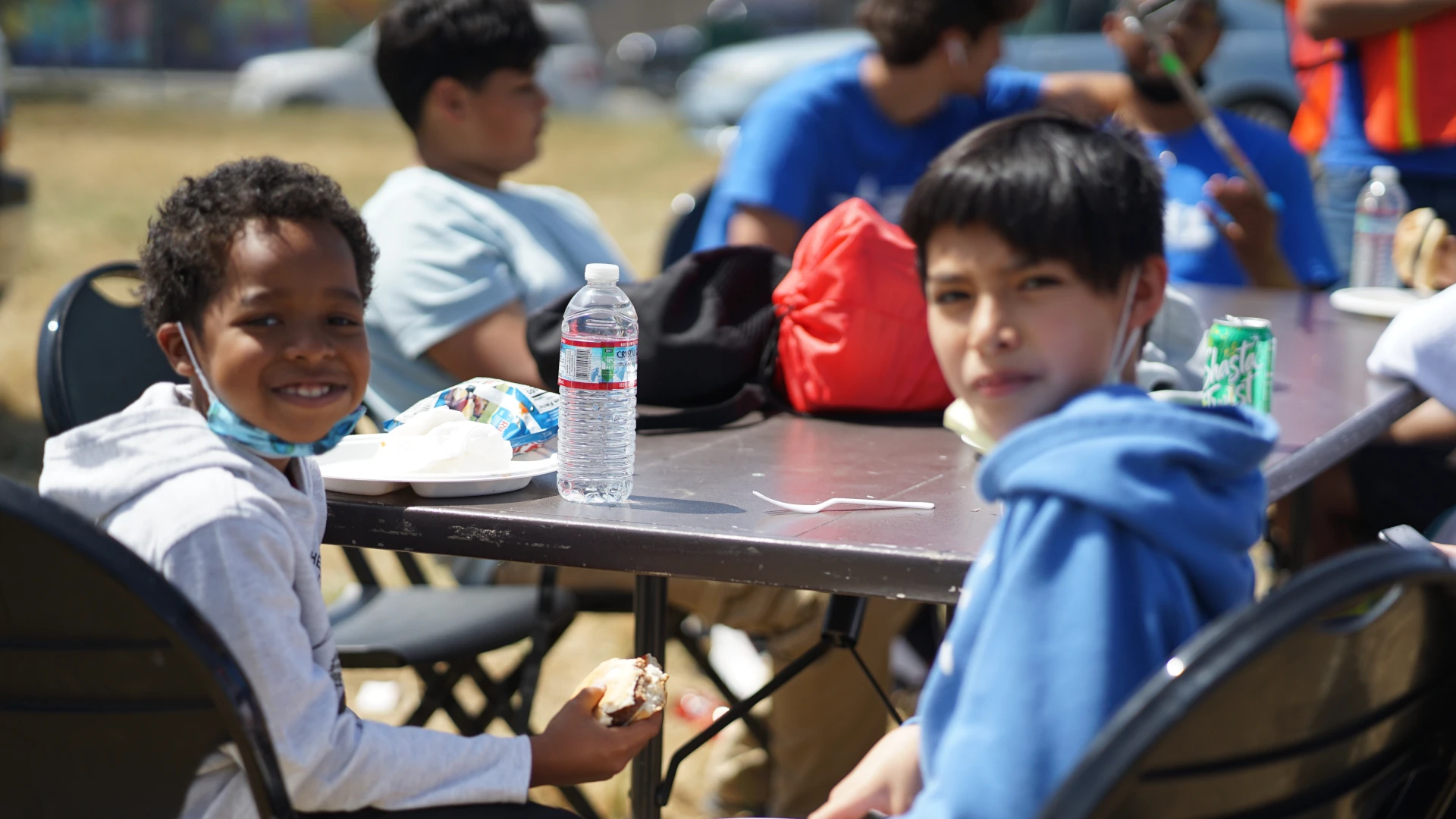 kids at outdoor picnic table