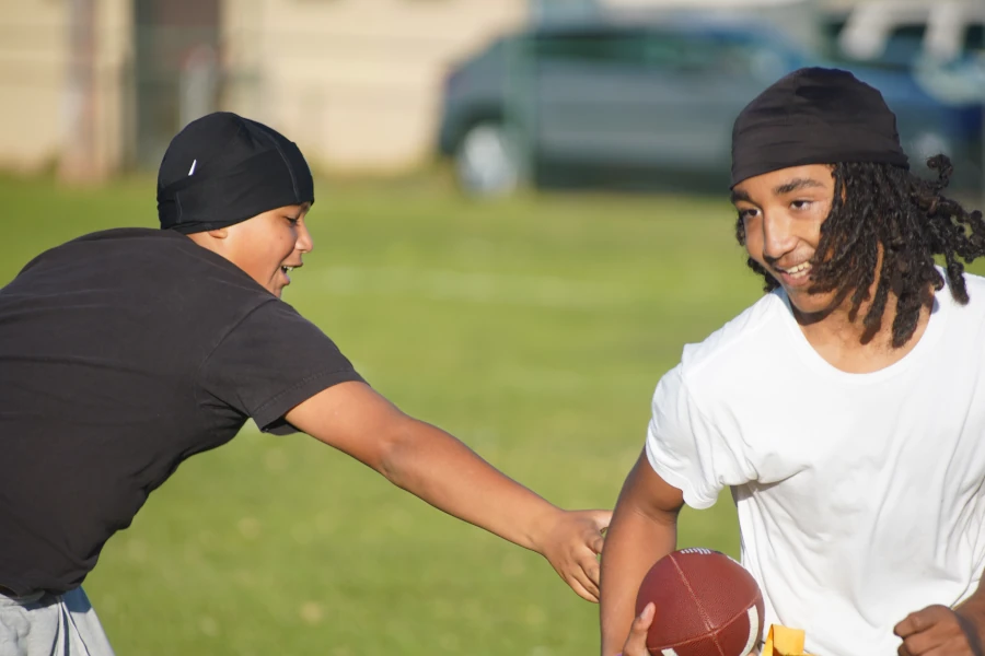 young men playing football